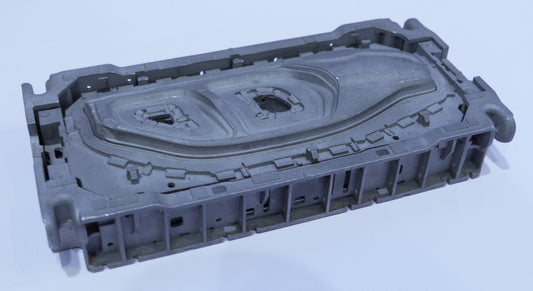 Complex metal 3D printed automotive enclosure with intricate surface detail and mounting features - SLM additive manufacturing by Make It 3D Philippines